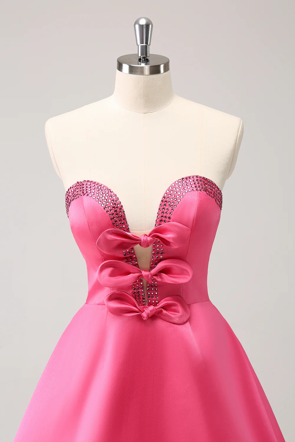 Sparkly Fuchsia A-Line Beaded Strapless Homecoming Dress with Bows